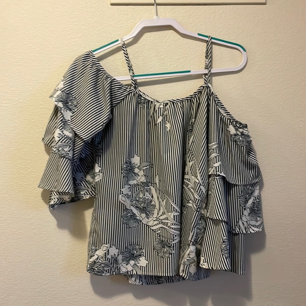 Black and white off the shoulders, mid length sleeves size S.
